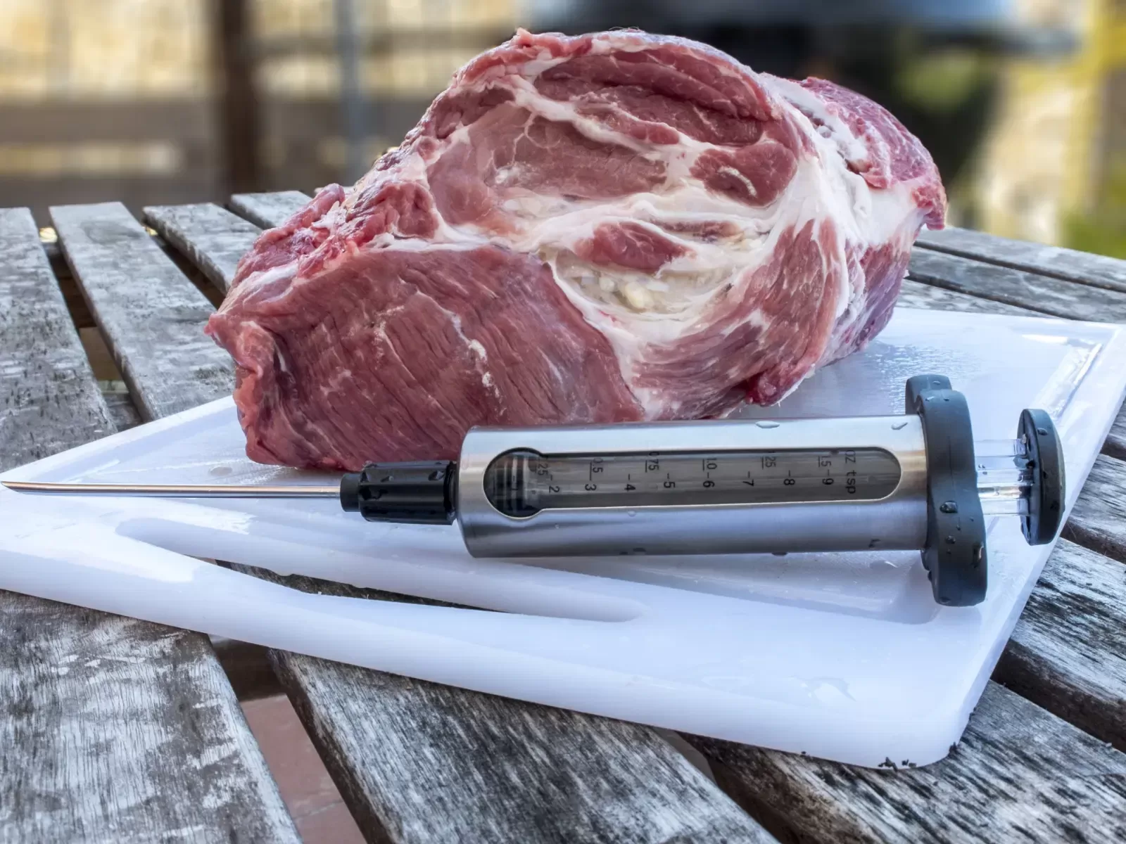 Meat with marinade injector